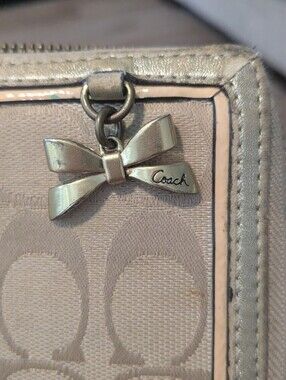 Coach Women's Bow Zip Wallet in Light Pink and Silver